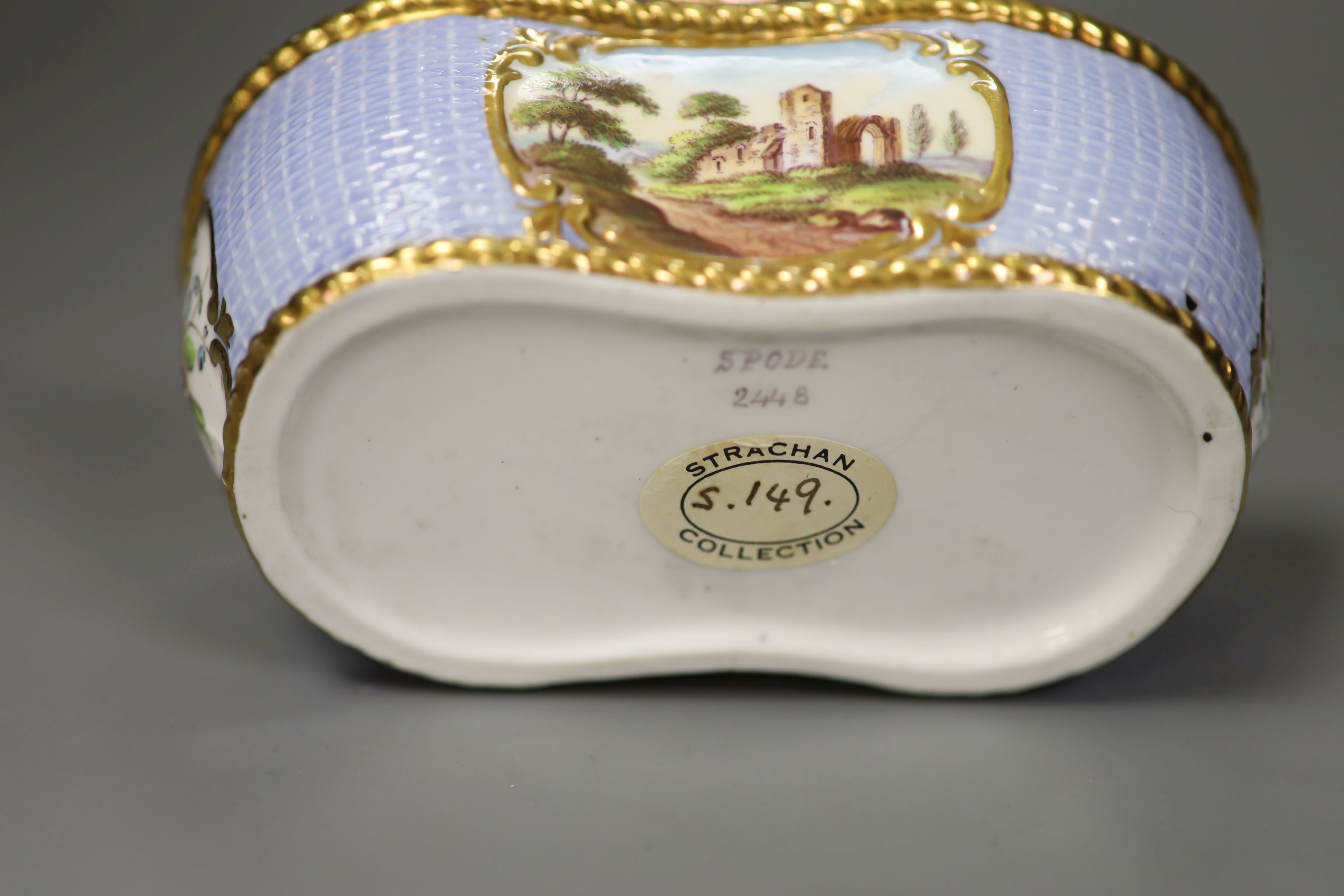 A Spode inkstand with basket weave moulding painted in blue having a landscape in gilt panels on each side c. 1820 Spode 2448 Strachan